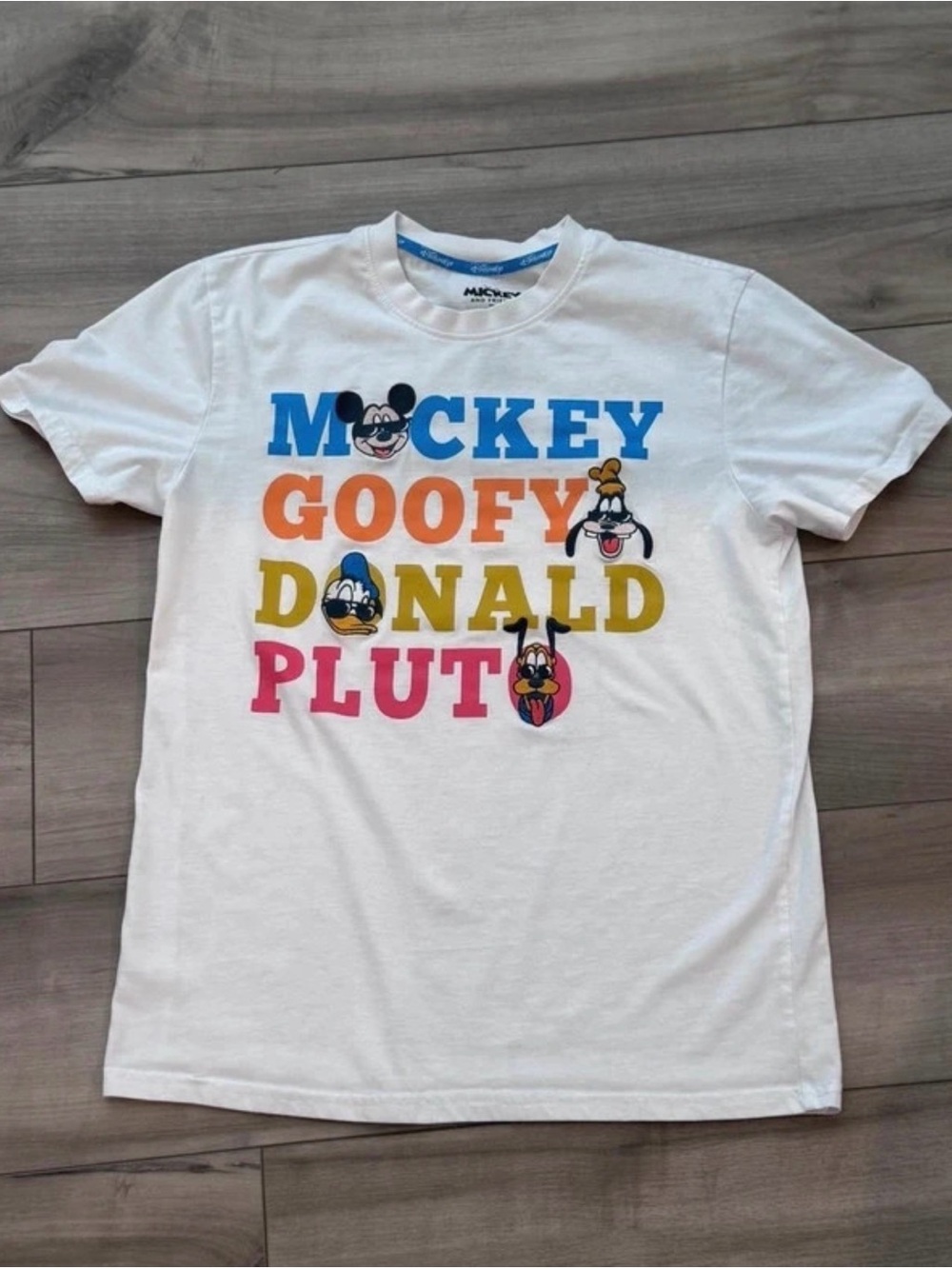 Disney White Graphic Tee with Blue, Orange, Yellow & Pink Lettering